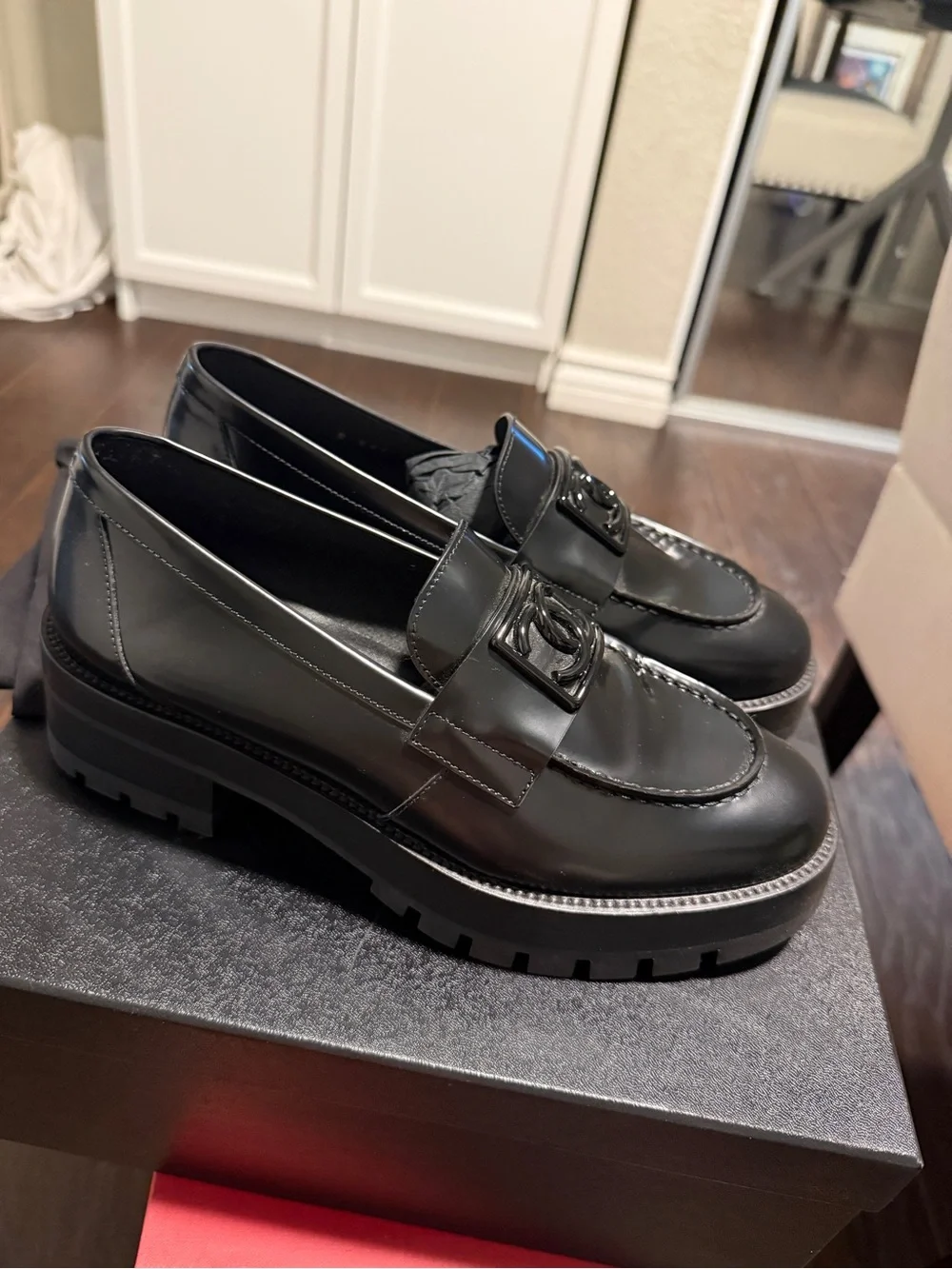 CHANEL Black on Black CC buckle loafers